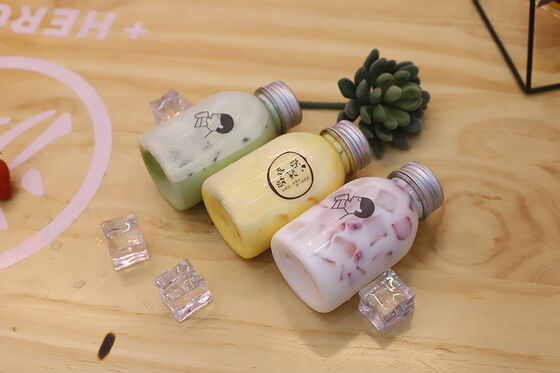 กล่องน้ําชานมขนาดกลางที่ติดสกรูปิด ลักษณะที่ป้องกันการรั่วไหล ให้ความสะดวกสบายและปลอดภัยในการจัดการเครื่องดื่ม